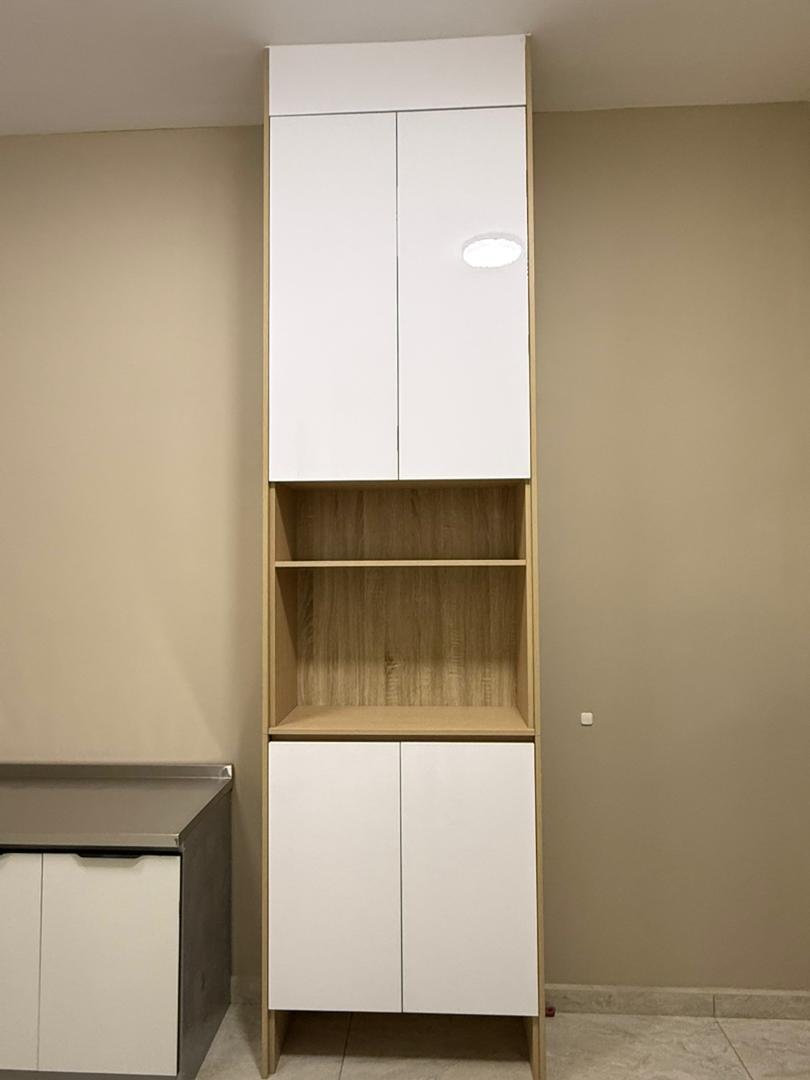 Walnut feature wall with floating cabinet, display shelves and low sideboard, Ambience Residence